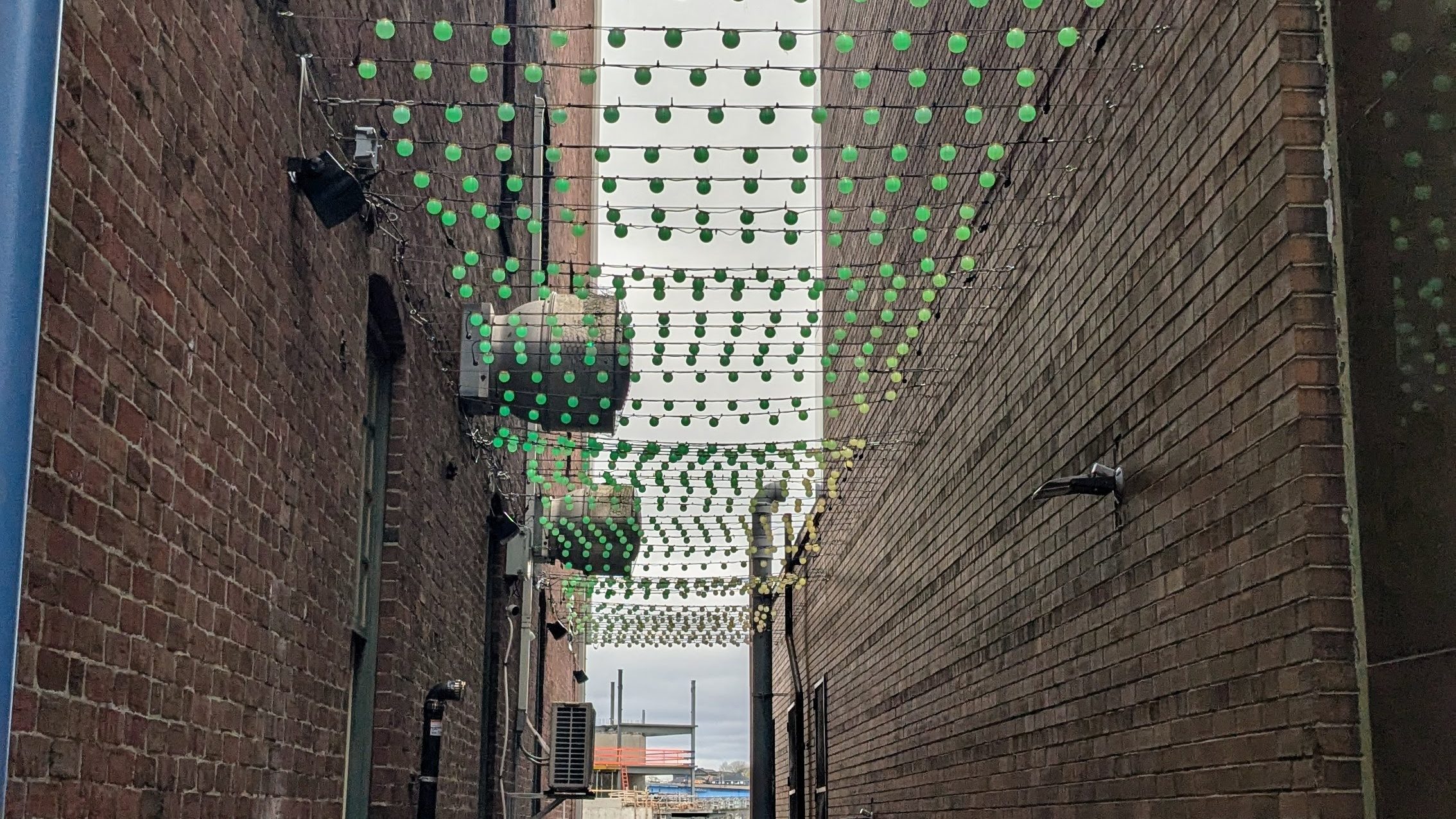 Decorative lights are strung across an alley in Uptown Saint John, NB.